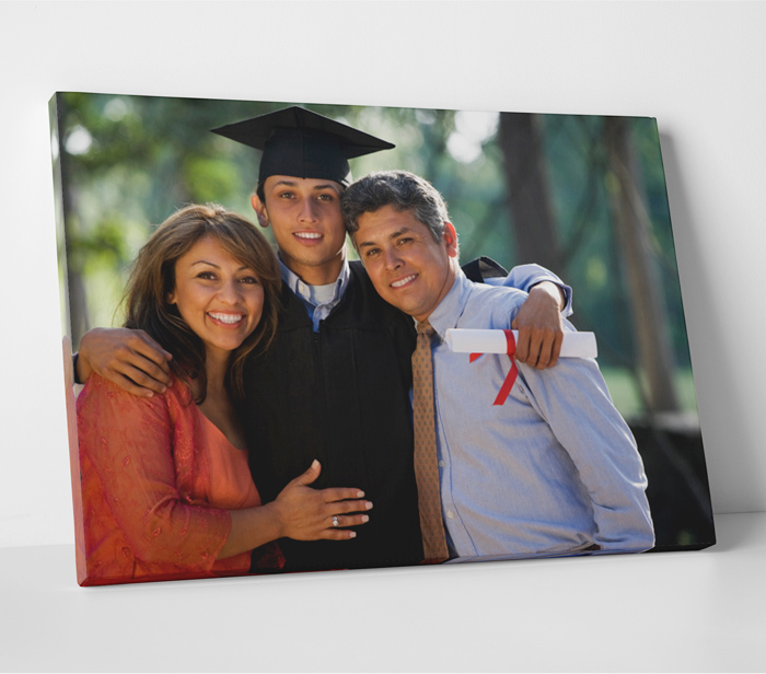 Graduation Day Photo of Student with his Parents on Canvas Prints 